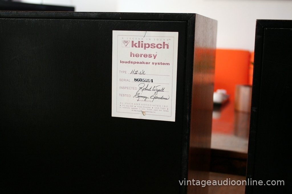 Klipsch label on the back of a Heresy II cabinet with handwritten details and signatures