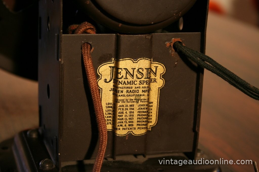 Gold label on the back of an early Jensen dynamic speaker